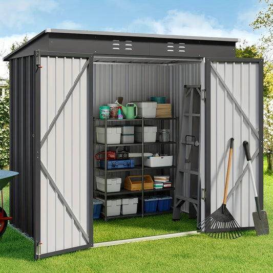Metal storage shed with open door showing shelves and gardening tools on a grassy area.